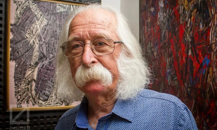 Ivan Marchuk reflects in the institute corridor