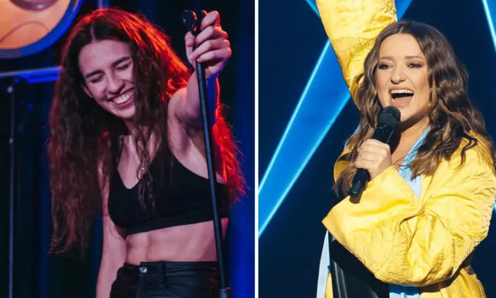 Nataliya Mogilevska in the arms of the singer