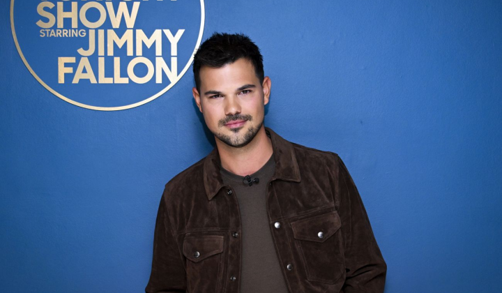Taylor Lautner with child