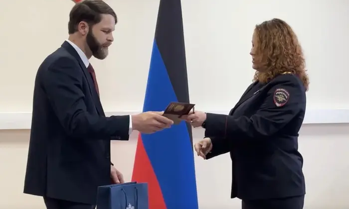 Американець із російським паспортом