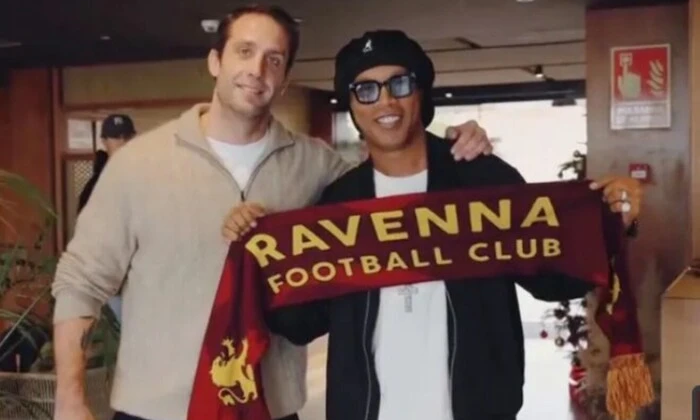 Ronaldinho playing football on the pitch