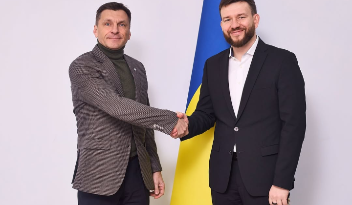 The state flag of Ukraine against the backdrop of digital technologies