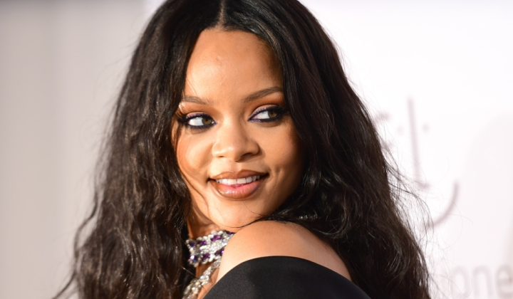 Rihanna in lace with 'Stop' sign and diamonds