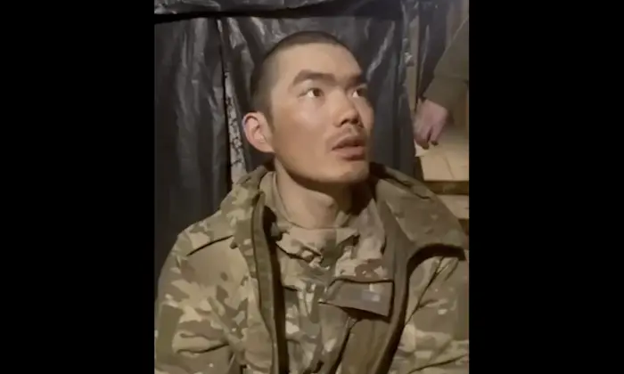 Полонені китайці під час допиту