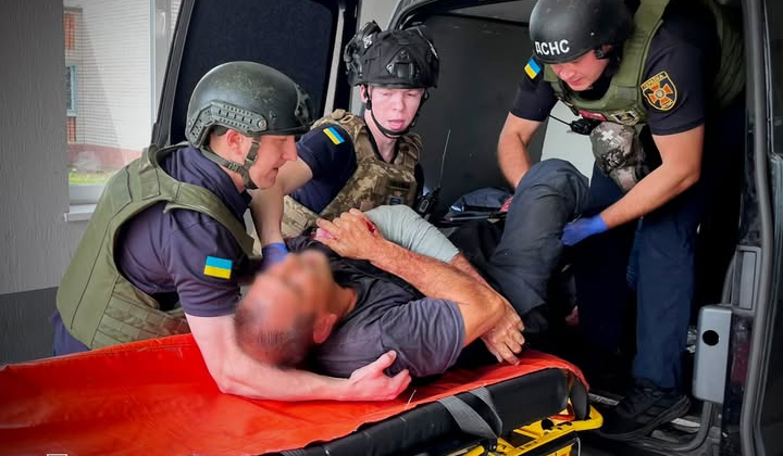 Injured rescuers as a result of Russian strike