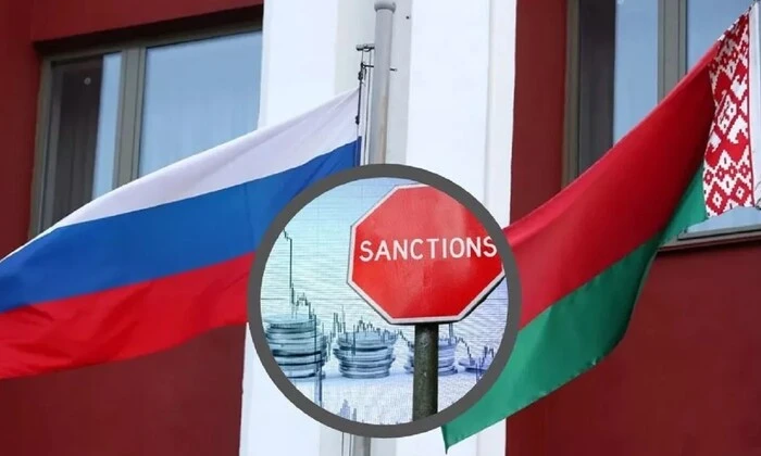 Флаги Росії і Білорусі на фоні стадіону