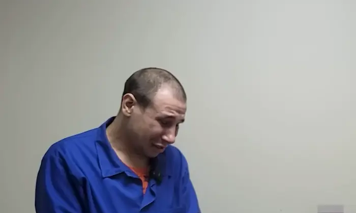 Mother of the captured invader crying