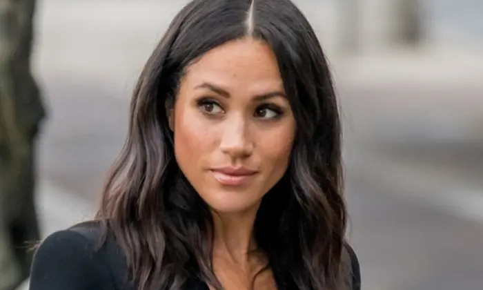 Меган Маркл на фоні Instagram