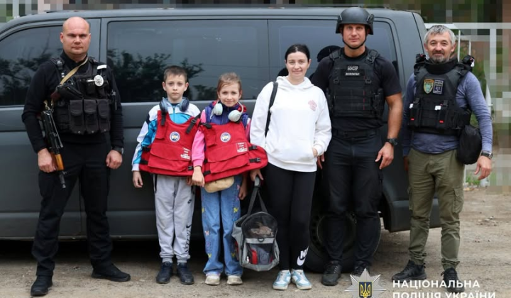 Evacuation of woman with children and pet