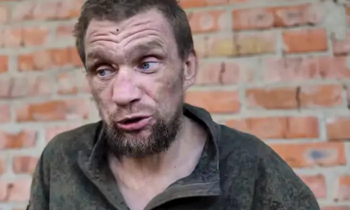 Полонений з руками в болоті