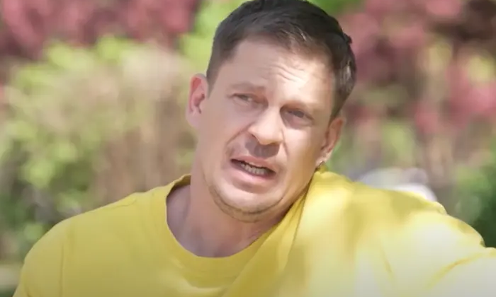 Actor Andrii Isaienko shows the middle finger