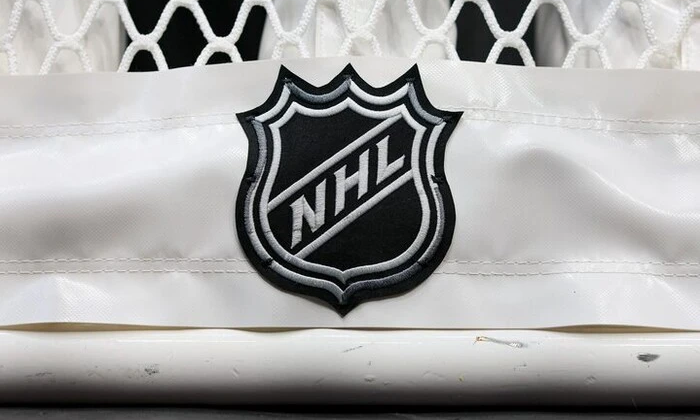 Зображено лого команд ХЛХ: хокейні емблеми