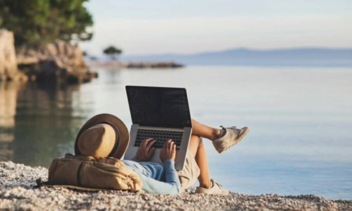 A group of young people relaxing on the beach