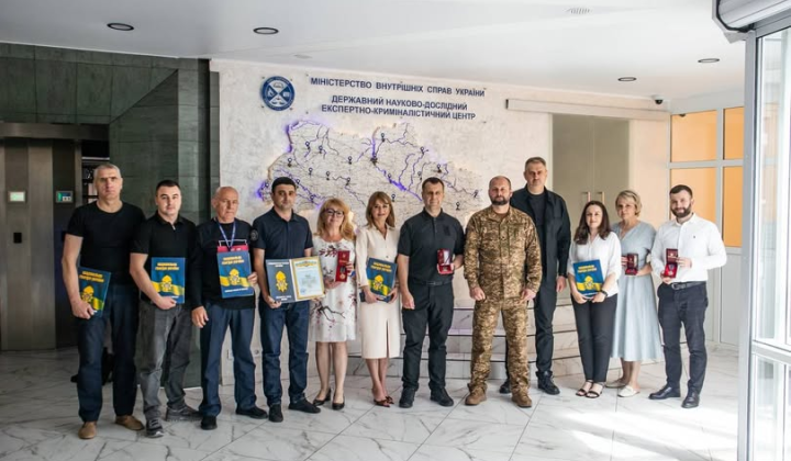 Employees of the DNDTS MIA celebrate the 26th anniversary of the Expert Service