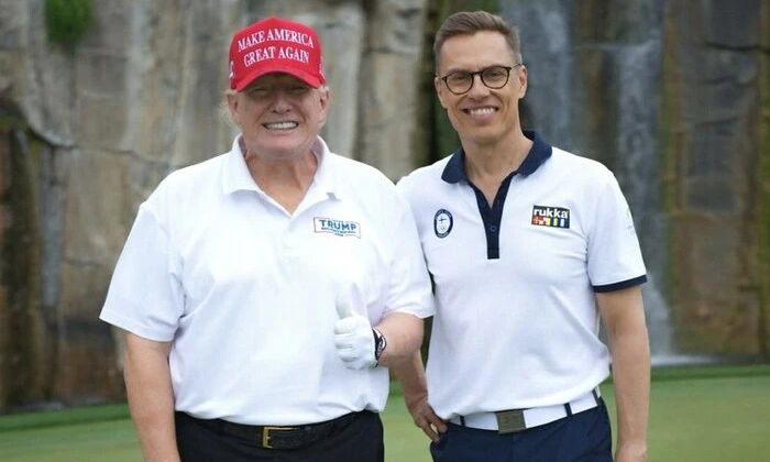Трамп и финский президент играют в гольф