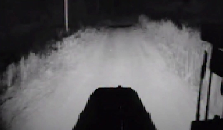 Drone tractor moving along the road
