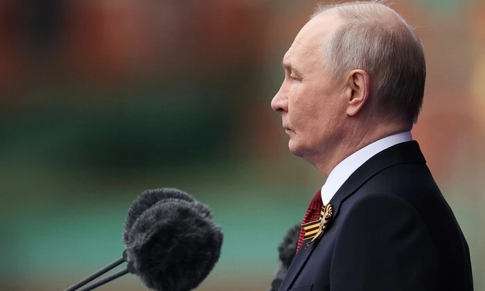 Путін парад перемоги Каддафі страх