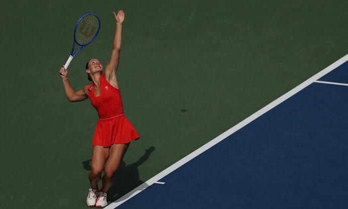 Marta Kostyuk celebrates victory