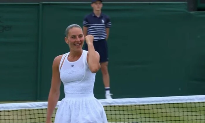 Marta Kostyuk on Wimbledon court