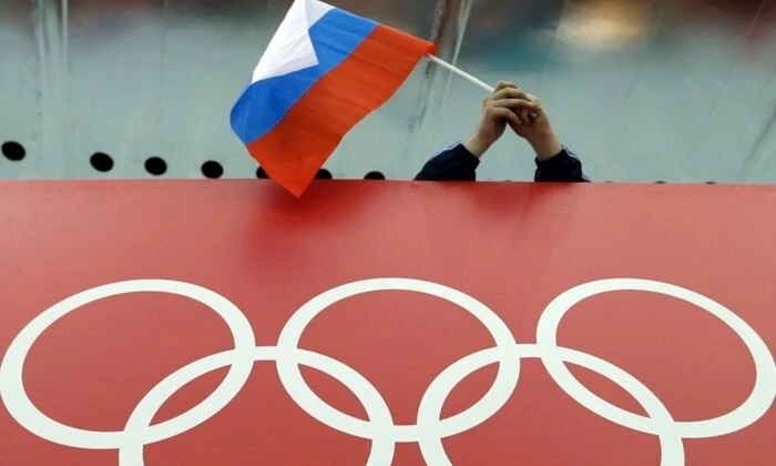 Изображение олимпийского флага и российского флага