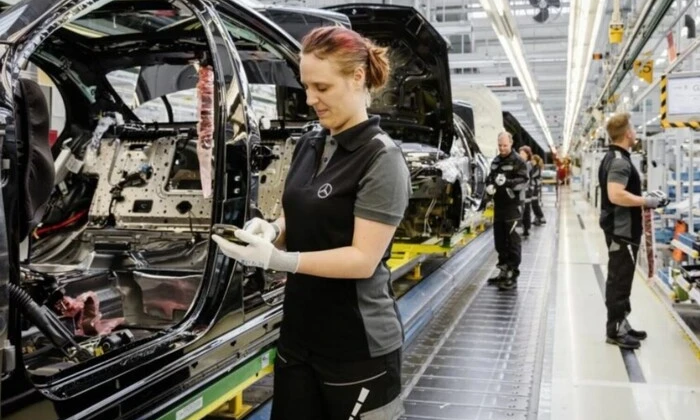 Немецкие жители работают рекордное количество часов