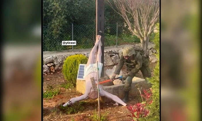 Image of damaged statue of Christ in Lebanon