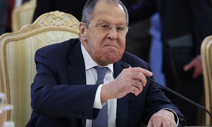 Photo of Lavrov with microphones at a briefing