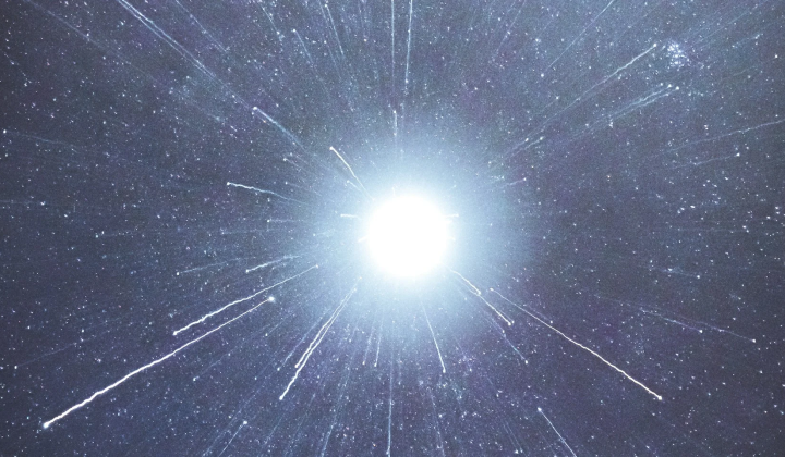 Photon 300 TeV overcoming 2 billion light years