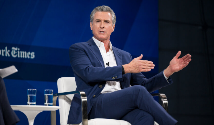 Analyst speaking at a press conference