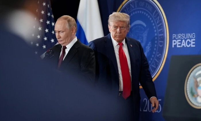 Trump and Putin talking at the table