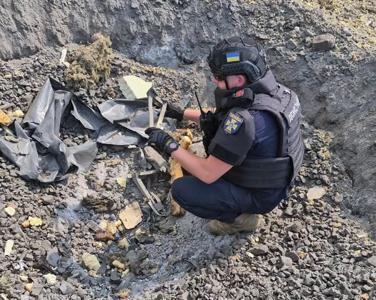 Rescuers remove remnants of the missile