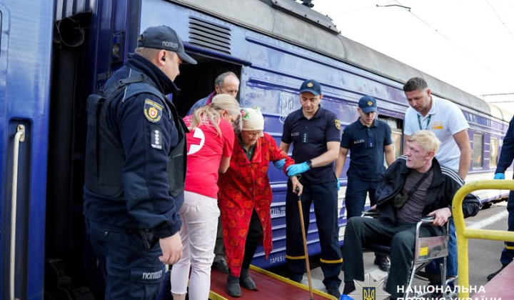 Group of elderly passengers at the station