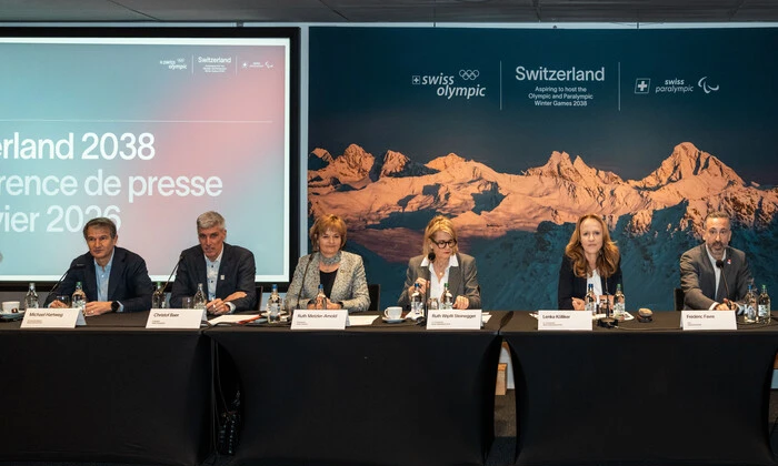 Switzerland flag with winter mountains background