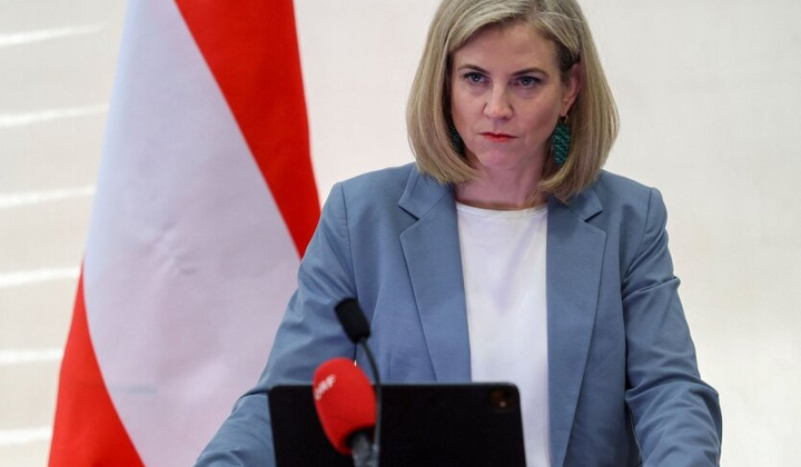 NATO flag against the background of the Austrian flag