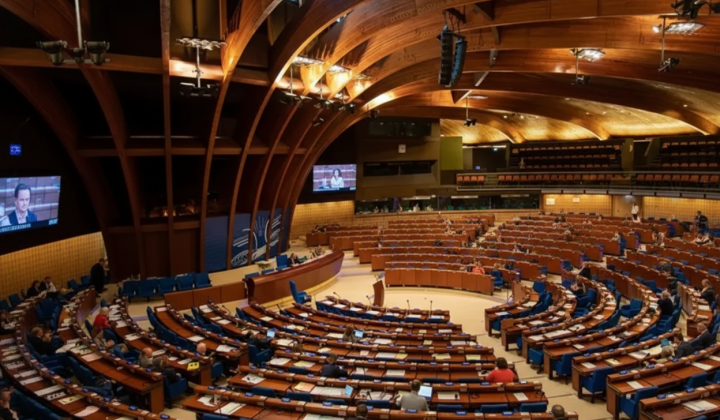 People reading documents in PACE