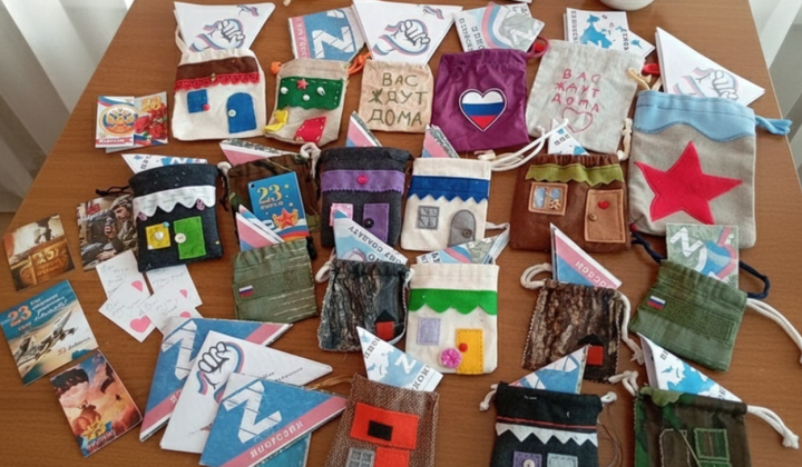 Schoolchildren making cards for Russian soldiers