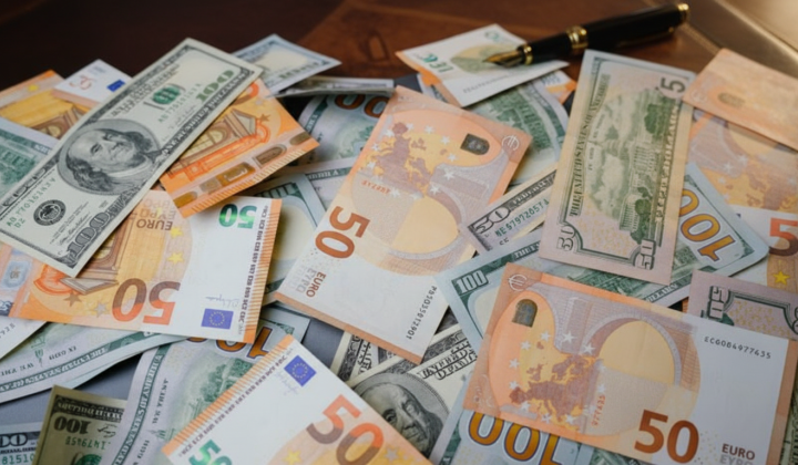 Ukrainian flags and money