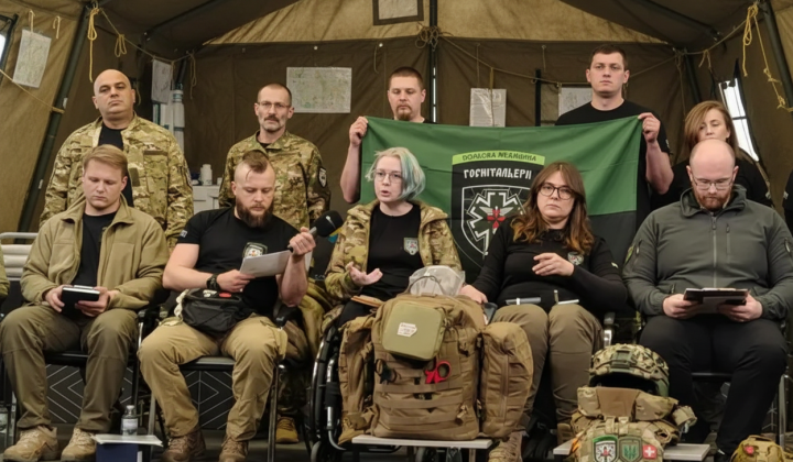 Volunteer battalion behind the fence