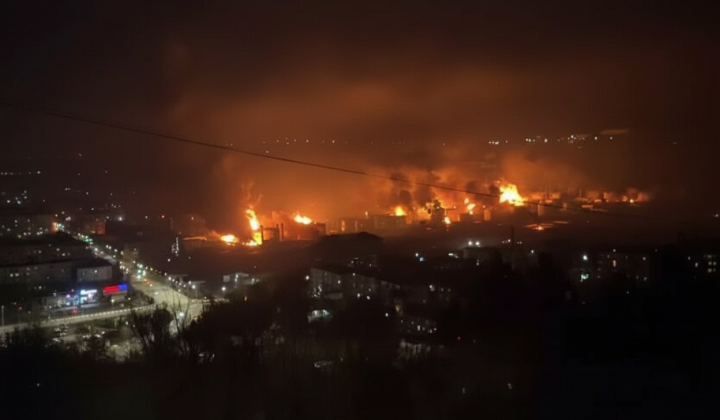 Ships and oil refinery under attack