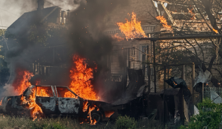 Burning house and car in Zaporizhia