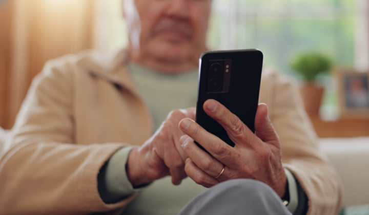 Pensioners checking physical identification for 2026