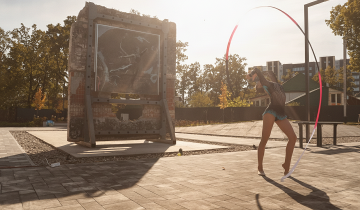 BANKSY square in Irpin, graffiti 'Gymnast with ribbon'