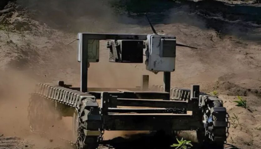 Студенти працюють з роботами у лабораторії